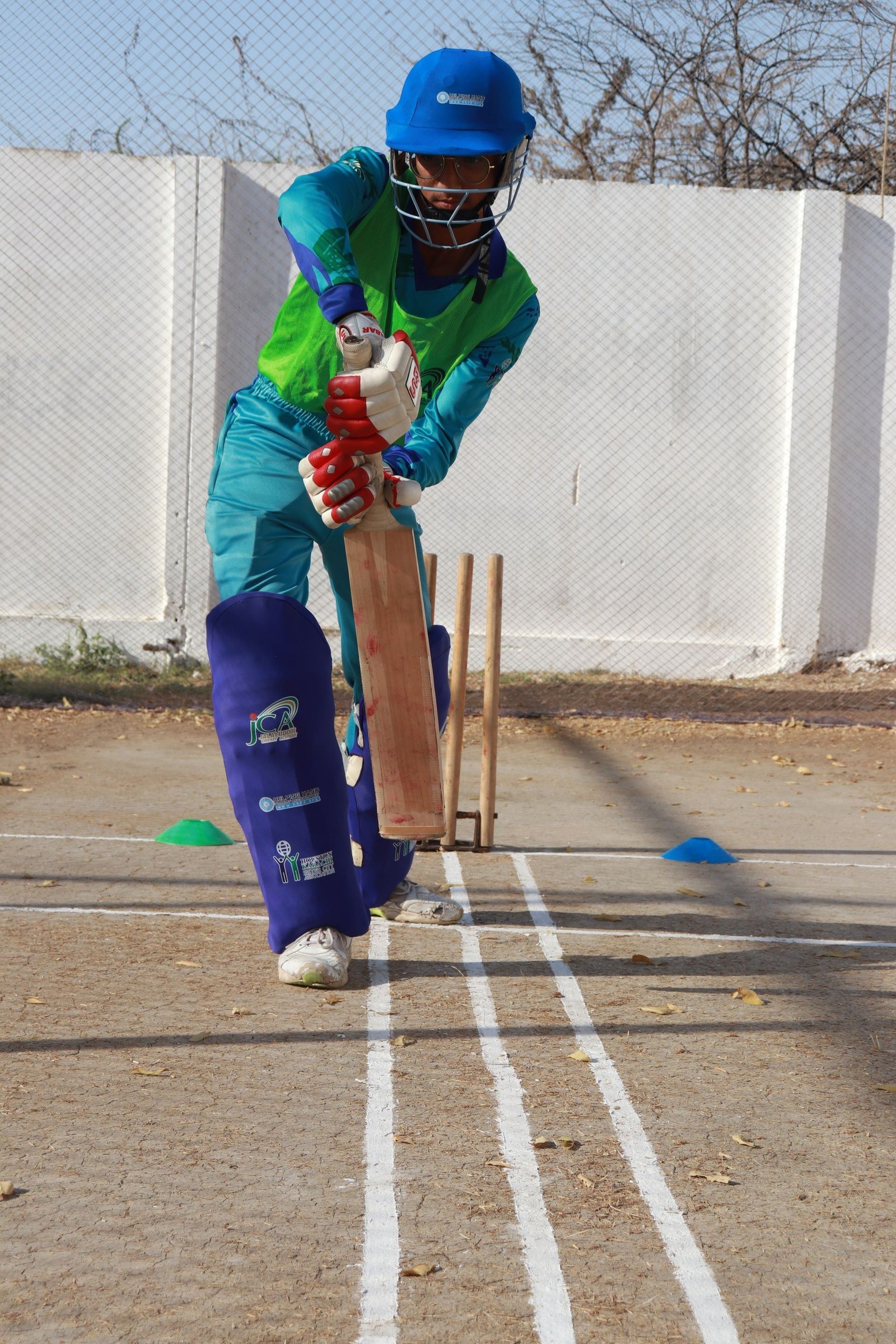 Player practicing batting technique in the nets